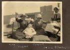 Group photograph of May McBain, Connie McBain, Sister Edwards and Hughie McBain, playing on the roof of their home, Malta, n.d. [ c.1919]