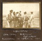Photograph of a naval gun team, including Spurgeon, marked, loading the gun aboard H.M. Sloop Cyclamen, blockading the Adriatic, 1918