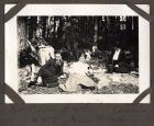 Photograph of Mrs. Banks, Hubert McBain, Connie McBain, Wilf McBain, and Miss Banks, having a picnic at Loch Eck, Argyll, May 1919