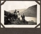Photograph of Hubert McBain, the Misses Banks and Connie McBain, sitting overlooking Loch Eck, Argyll, May 1919