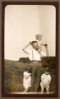Photograph of George Pinkney in civilian dress, and three young children, n.d. [ c.1930]
