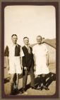 Photograph of three unidentified soldiers in football kit and civilian dress, Razmak, North West Frontier Province, India, n.d. [1930]