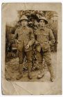Photograph of two unidentified company sergeants, wearing steel helmets, France and Belgium, n.d. [1916 - 1918] 
Endorsed: To my dear wife, John