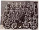 Group photograph of officers of various regiments at the School of Musketry, Hythe, Kent, including Captain S.M. Rowlandson, 3rd Battalion The Durham Light Infantry, third row, fourth from left, n.d. 