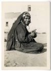 Photograph of a seated Arab tribeswoman, possibly in Egypt, c.1942