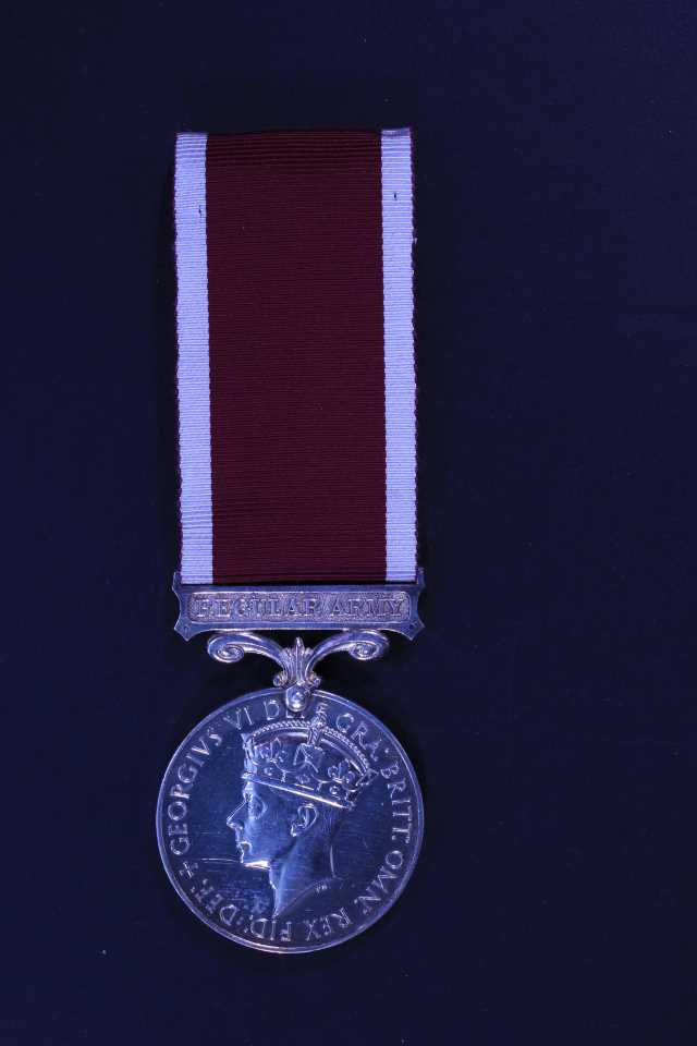 Long Service & Good Conduct - LT. (Q.M.) G. FLANNIGAN. D.L.I