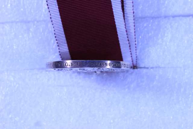 Long Service & Good Conduct - LT. (Q.M.) G. FLANNIGAN. D.L.I