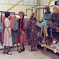 Five female factory workers modelling dresses made at the Runpoint garment factory, Aycliffe Industrial Estate, c.1980 (