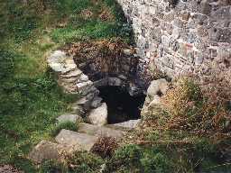 Jenny Bell's Well, Holy Island, after consolidation. Photo by Northumberland County Council.