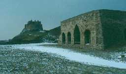 Holy Island lime kilns and Lindisfarne Castle in the background. Photo by The Archaeological Practice.