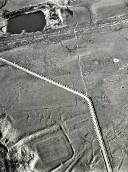 Aerial view of Roman camps by the Haltwhistle Burn with the fortlet at the bottom of the image. Photo © Tim Gates.