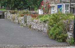 Walls, north side of Hunstanworth village street 2004