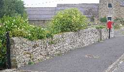 Walls, north side of Hunstanworth village street 2004