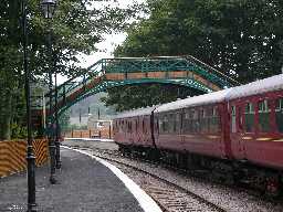 Footbridge over Railway with train, Stanhope  2004