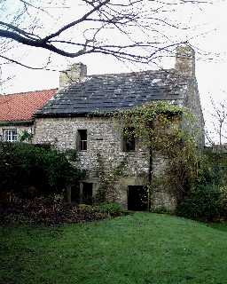 Old Smithy & adjacent Cottage (garden view)  © DCC 2003