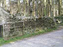 Wall enclosing Yard at former Saddle House  © DCC 2003