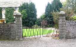 Wall and piers enclosing garden in front of toft h © DCC 2005