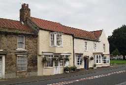 Central Buildings, Staindrop (west end - north) © DCC 2003