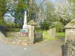 Photo of entrance and of War Memorial Cross, Church Lane, Hunwick 2016