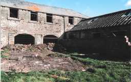 Farmstead  east yard and W facing elevation of east wing 04/2011