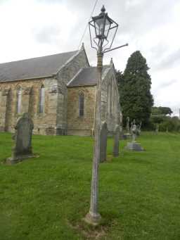 Side view and lamp post of St. John the Evangelist's Church, Lynesack 2016
