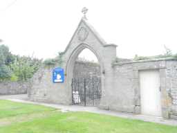 Side view photograph of Gateway, approach walls and south wall to St. Michael's Churchyard 2016