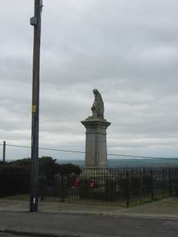 Medium shot of Billy Hill War Memorial and fence 2016