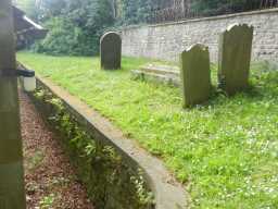 Photograph of wall and Tomb of Newby Lowson, Church of St. Philip and St. James 2016