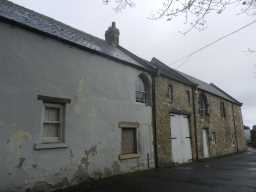 Photograph of front of of Farmhouse and Adjacent Barn, Seaton Holme 2016