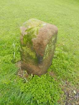 Photograph of side of Milestone, 75 m North of Manor House 2016