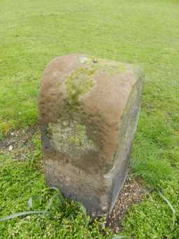 Close up photograph of Milestone, 75 m North of Manor House 2016