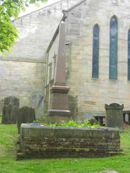 Photograph of tomb and obelisk in front of St. Margaret of Antioch Church 2016