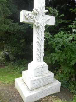 Photograph of marble cross on stepped base at Church of St. Ebba 2016