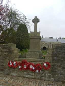 Close up photograph of War Memorial Cross, St. Thomas' Church 2016