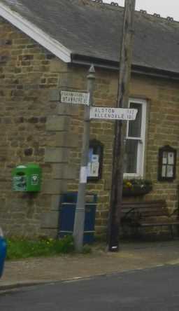 Close up photograph of Guidepost at junction of A689 & Causeway Road, Ireshopeburn 2016