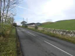 Photograph of road and Milepost 2016