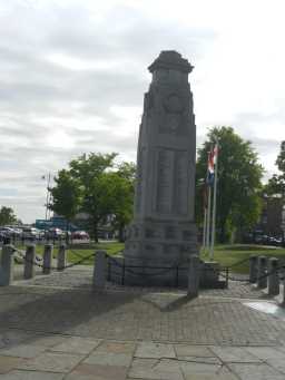 War Memorial Cenotaph, from back, with flags Town Centre, Crook 2016