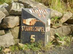 Milepost, A689, west of Park Level Mine, Killhope showing 5 to St John'sChapel 2016