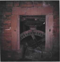 Machinery seen through opening from wheel pit. 07/09/1985