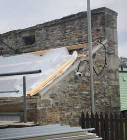 Stanhope Caravan Site wall - Buttress at West end of wall with rectangular hole above sheds 28/03/2022