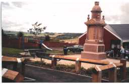 Photograph of the war memorial facing North West June 2002