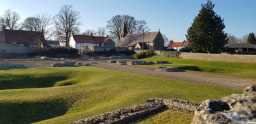 Piercebridge Roman fort with St. Mary's Church in the background 19-MAR-2022